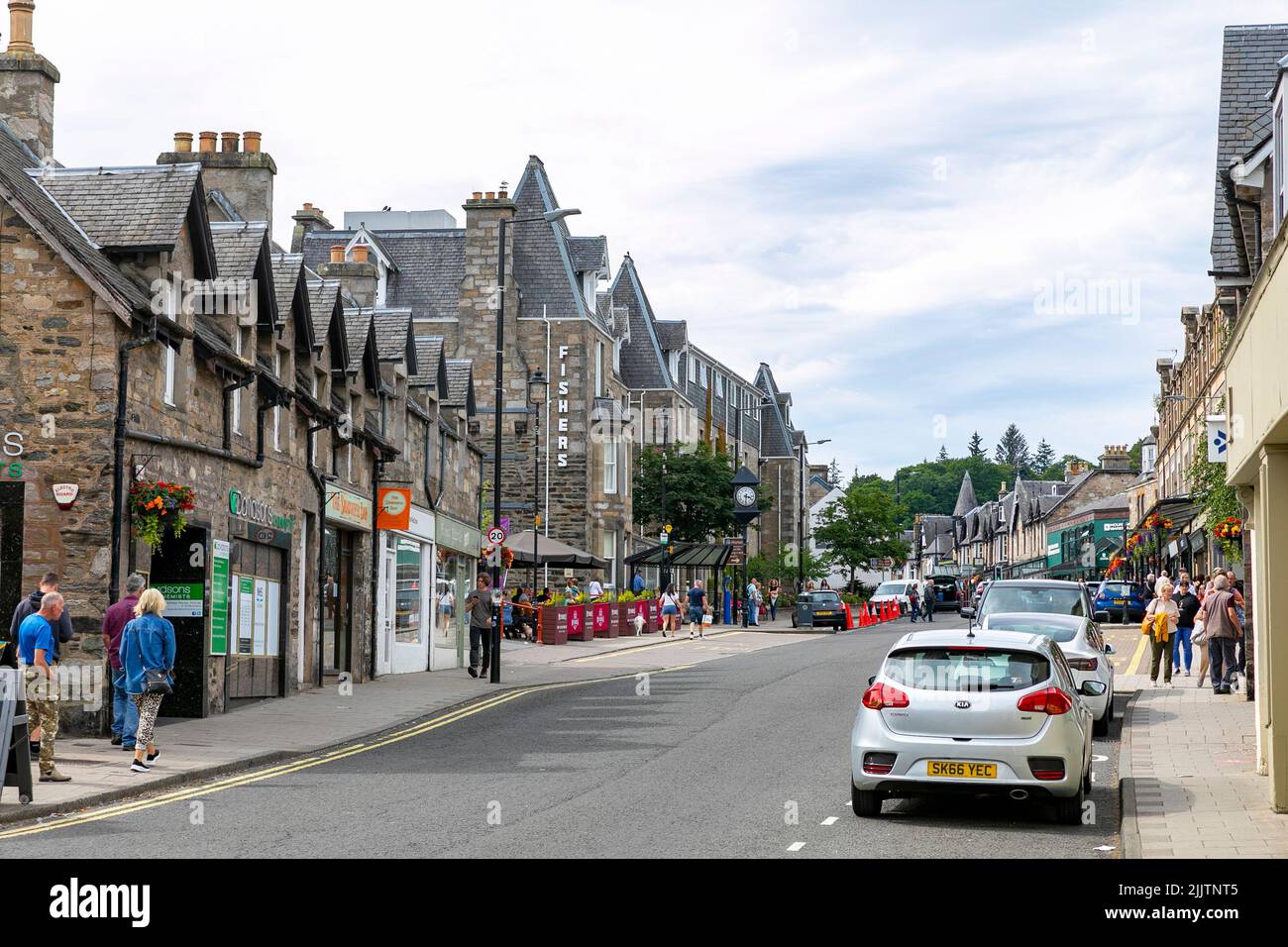 Pitlochry town centre in Perthshire, Atholl road is the Main Street through the town with shops and restaurants,Scotland,UK,summer 2022 Stock Photo