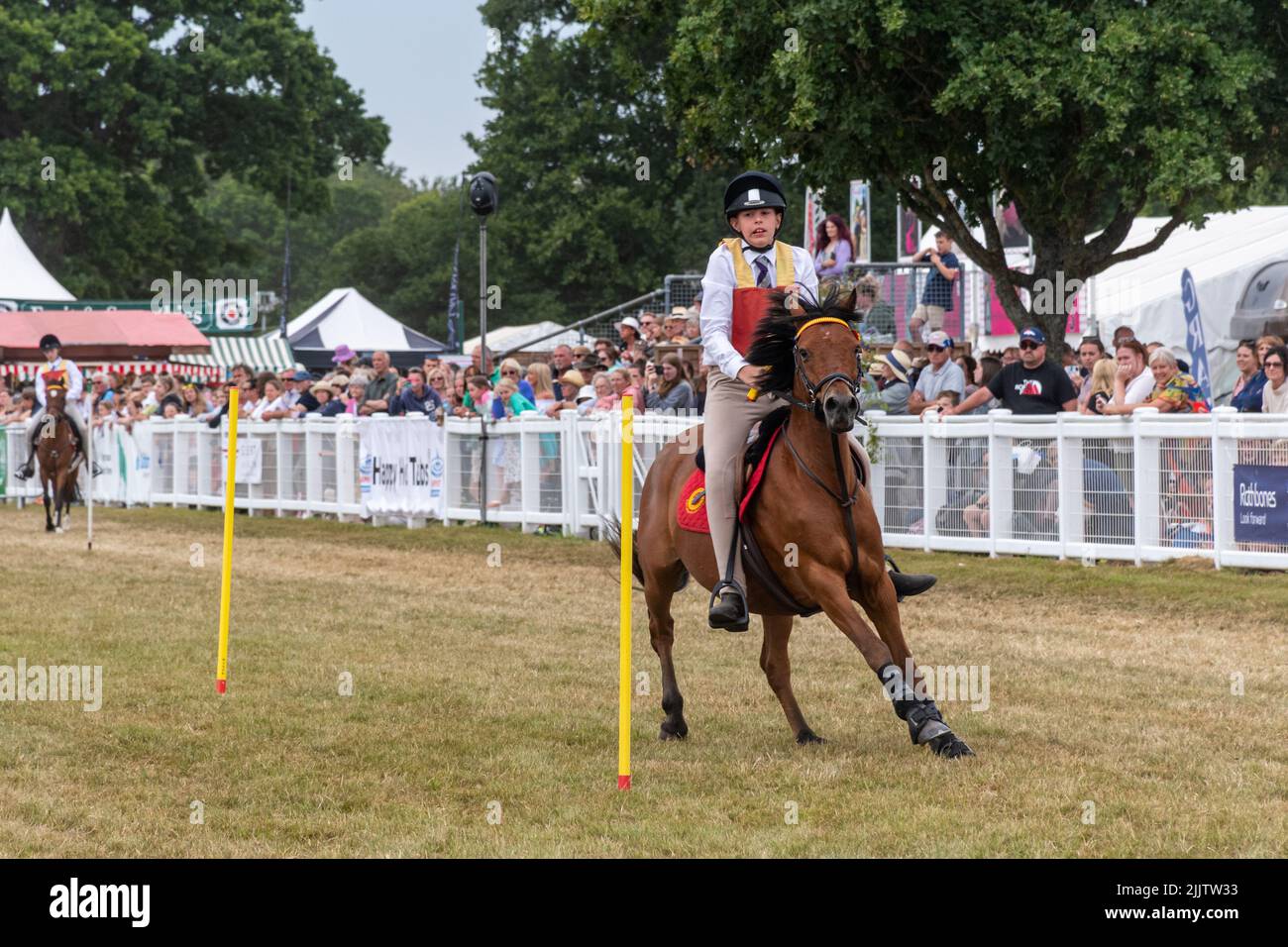 New Forest and Hampshire County Show in July 2022, England, UK. Pony Club mounted games display in the arena. Stock Photo