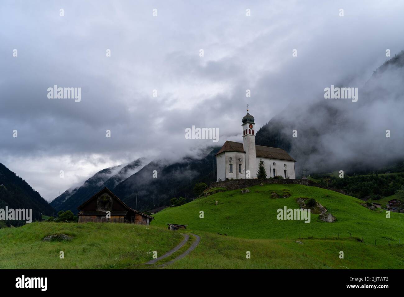 Switzerland mountain sky church hi-res stock photography and images - Alamy