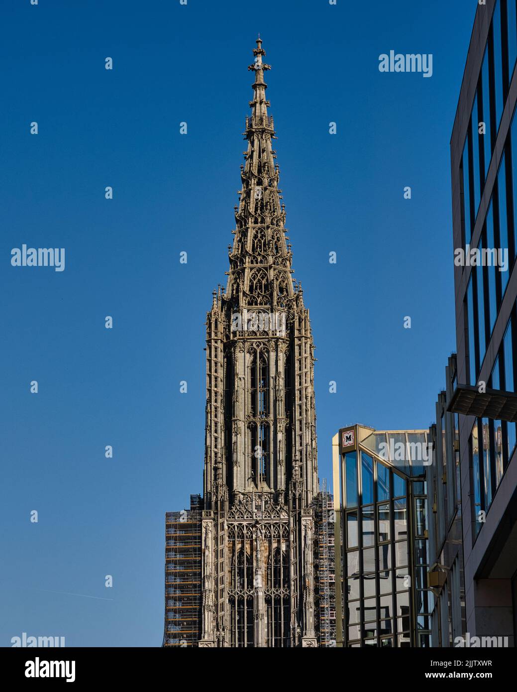 A vertical shot of an urban area with historic buildings in Ulm City, Munster, Germany Stock Photo
