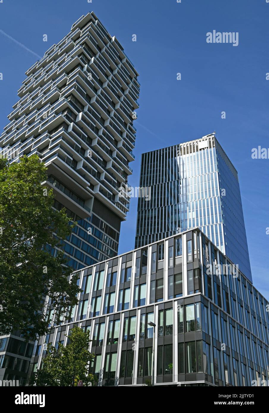 28 July 2022, Hessen, Frankfurt/Main: The 'One Forty West' high-rise (l) and the 'Senckenberg Tower' by Cyrus Moser Architects tower high in the 'Senckenberg Quarter'. The four-part 'Senckenberg Quarter' building complex is one of the new high-rise buildings in Frankfurt nominated for the International Highrise Award. A total of 34 high-rise buildings on four continents are in the running. (to dpa 'Two Frankfurt buildings nominated for high-rise award') Photo: Arne Dedert/dpa Stock Photo