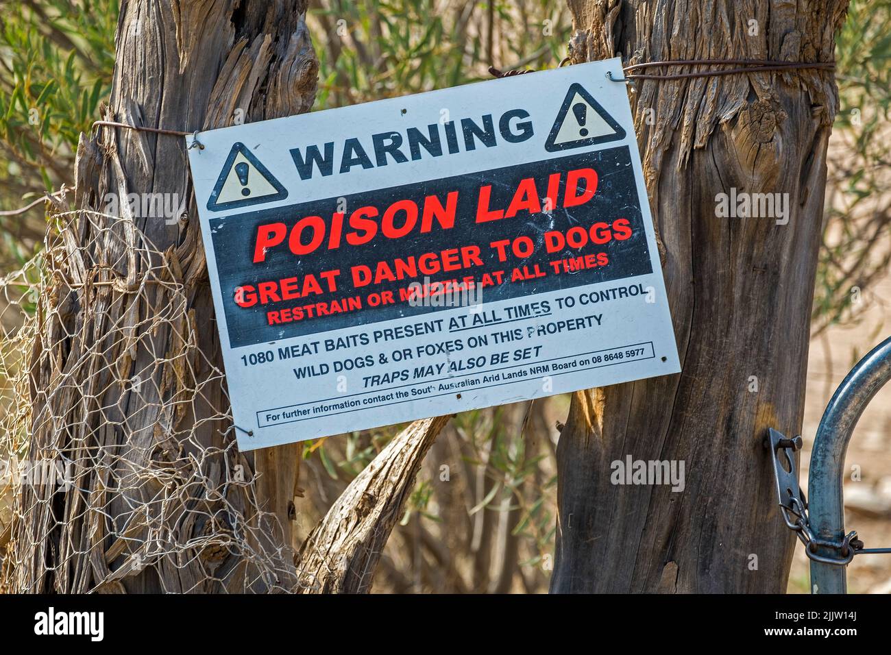 Warning sign of 1080 poison baiting near Wilpena Pound in South Australia Stock Photo