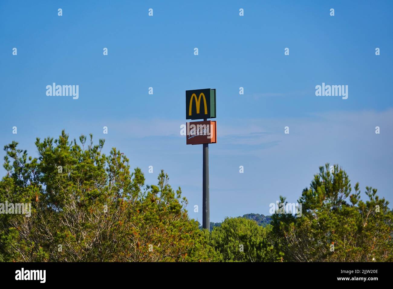 Picture shows a teleshot of a McDonalds McCafe sign near Cala Millor, Mallorca Stock Photo