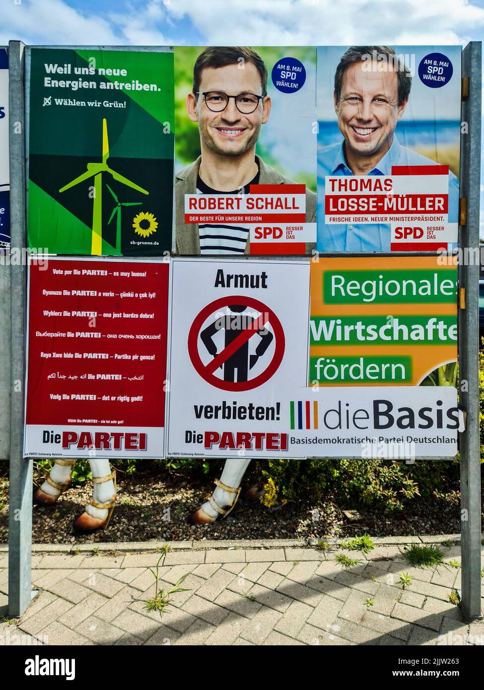 A billboard with party advertisements of different parties for the ...