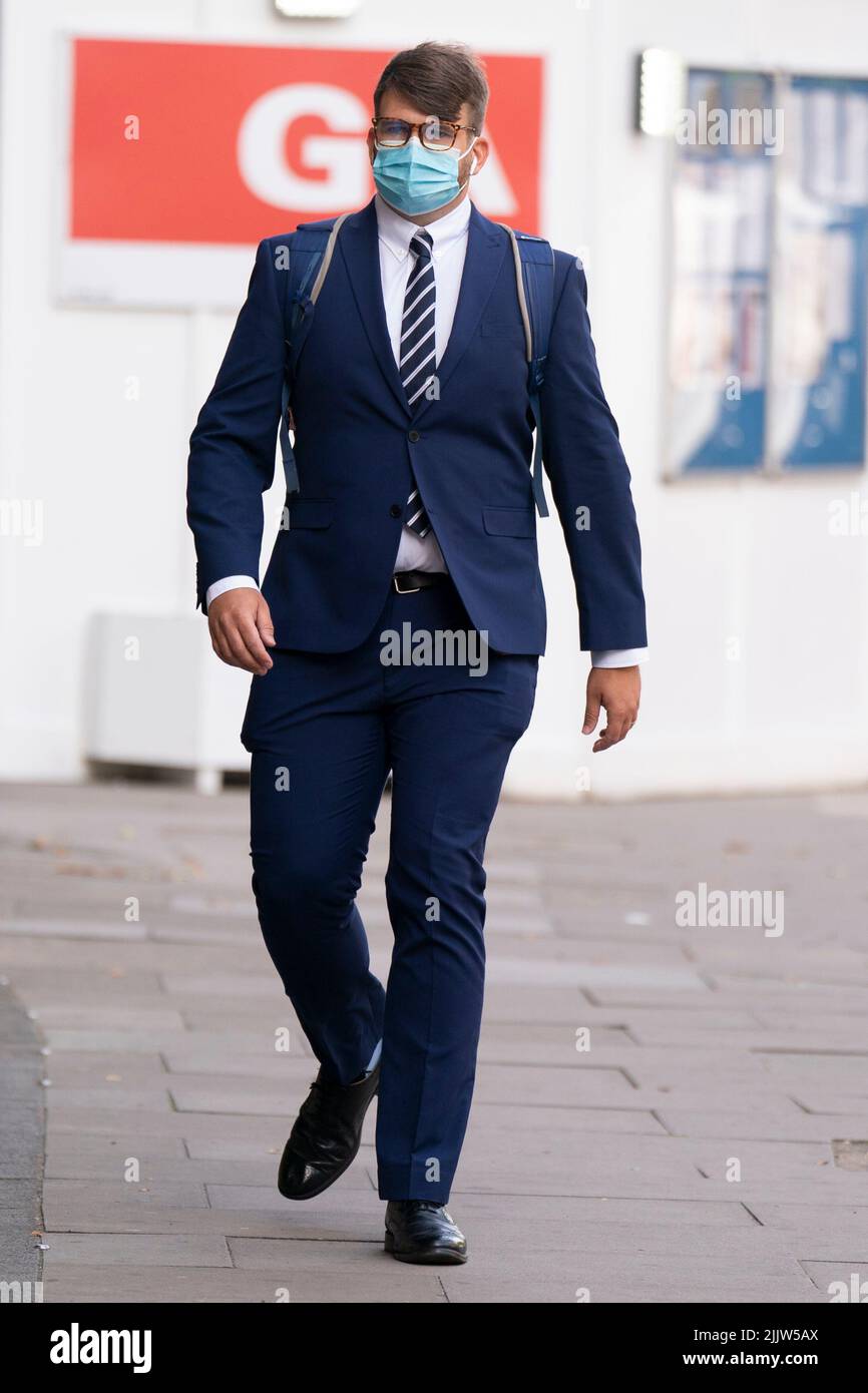 Serving Metropolitan Police Pc William Neville arriving at Westminster Magistrates' Court, London, where he is charged with sharing "grossly offensive" WhatsApp messages with Sarah Everard murderer Wayne Couzens. Picture date: Thursday July 28, 2022. Stock Photo