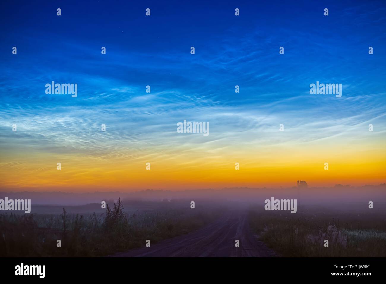 Night shining - Noctilucent clouds at night, panorama Stock Photo