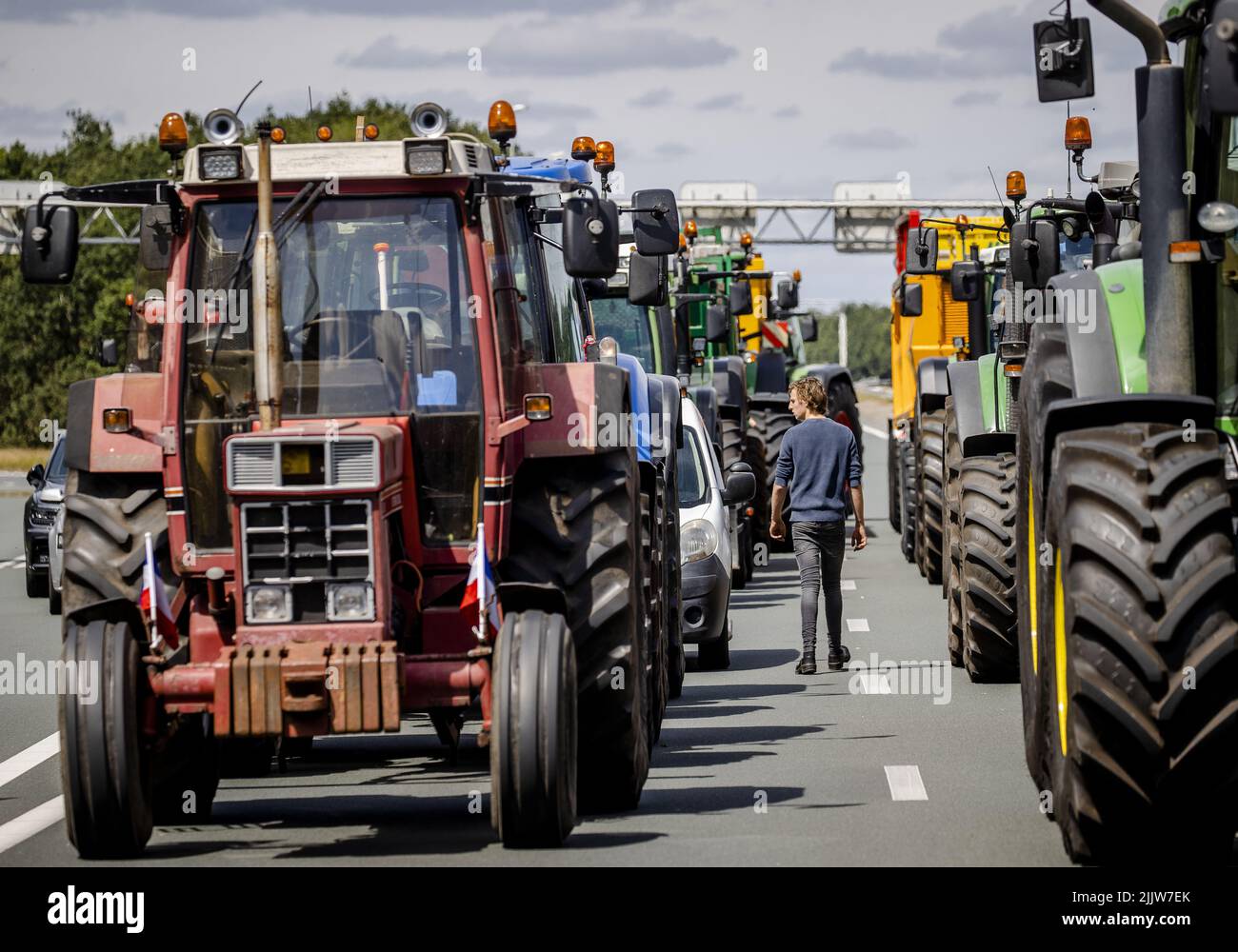 20220728 130513 AZELO Tractors are blocking the highway at the