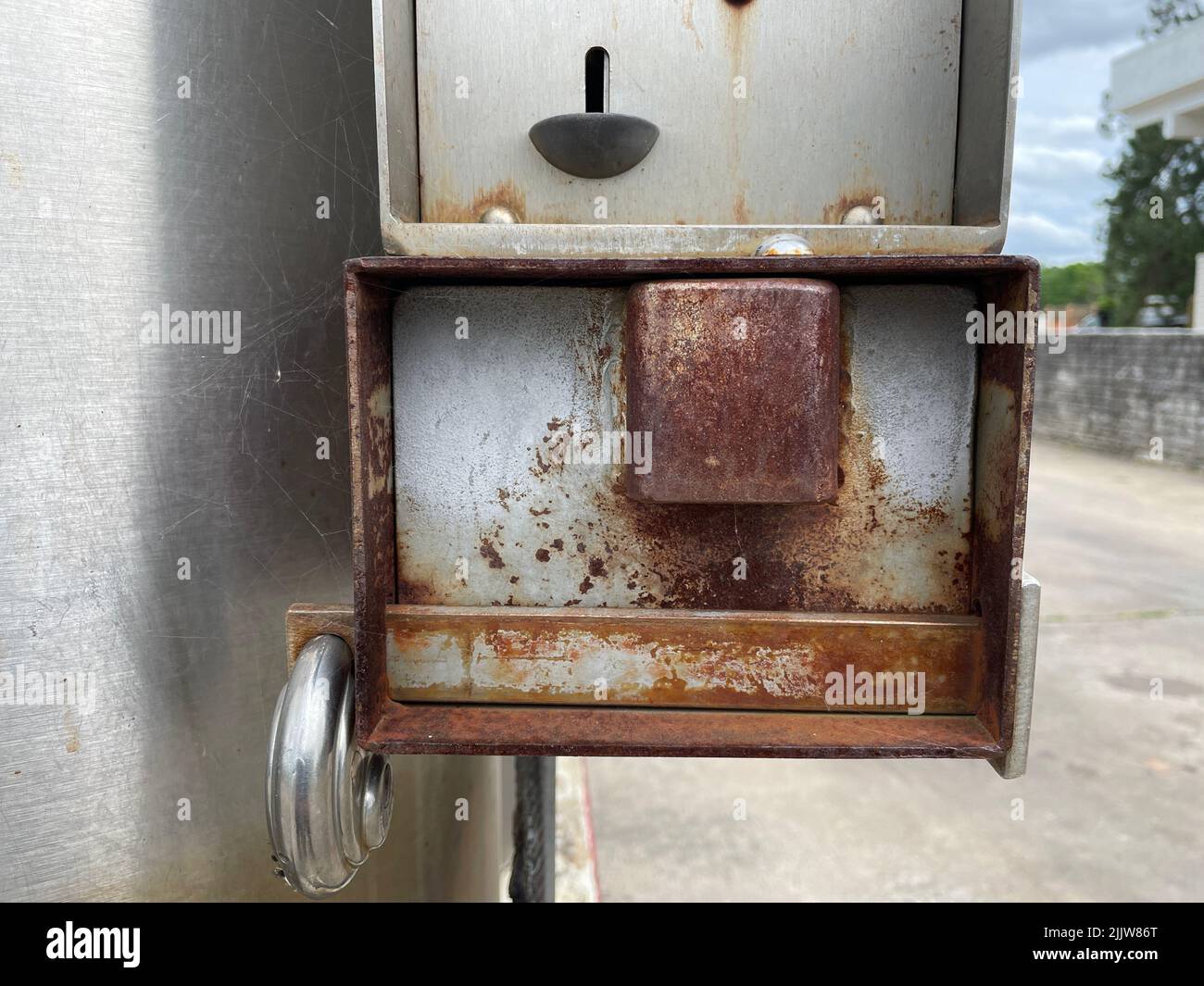 Waynesboro, Ga USA - 04 12 22: Vintage coin car wash rusted change box ...