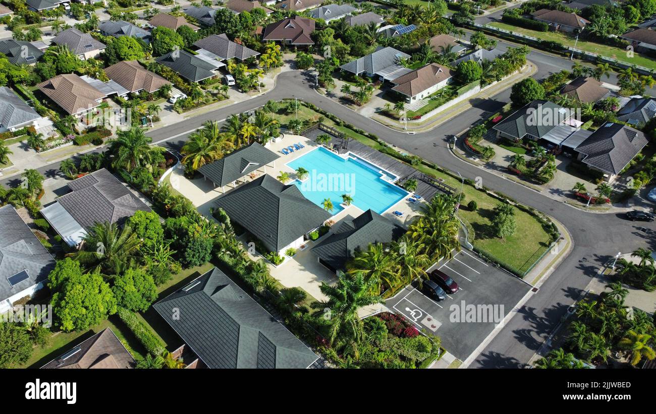 An aerial of houses near a swimming pool in Montego Bay, Jamaica Stock Photo