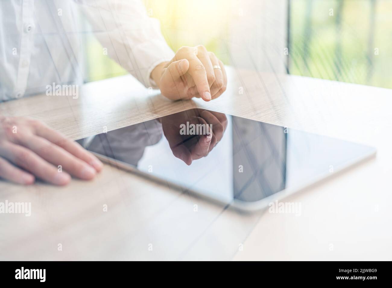 Engineer or businesswoman using tablet pc on the internet technology background. Stock Photo