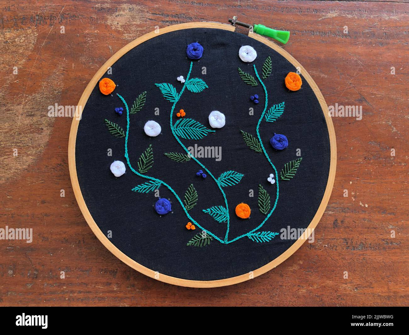 Hand embroidery cross stitch flower ornament hires stock photography