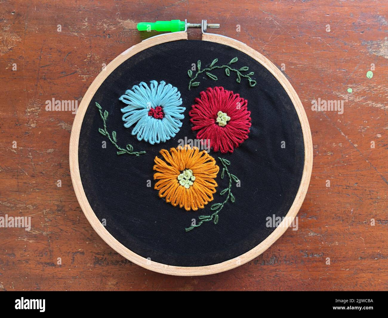 Hand embroidery flower hi-res stock photography and images - Alamy