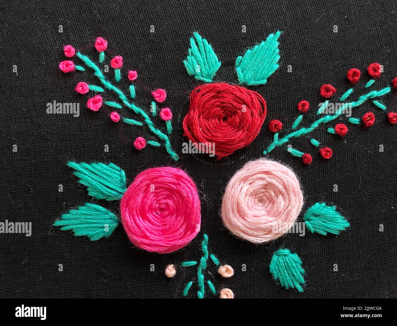 Hand embroidery rose flower stitch (wagon wheel stitch) Stock Photo