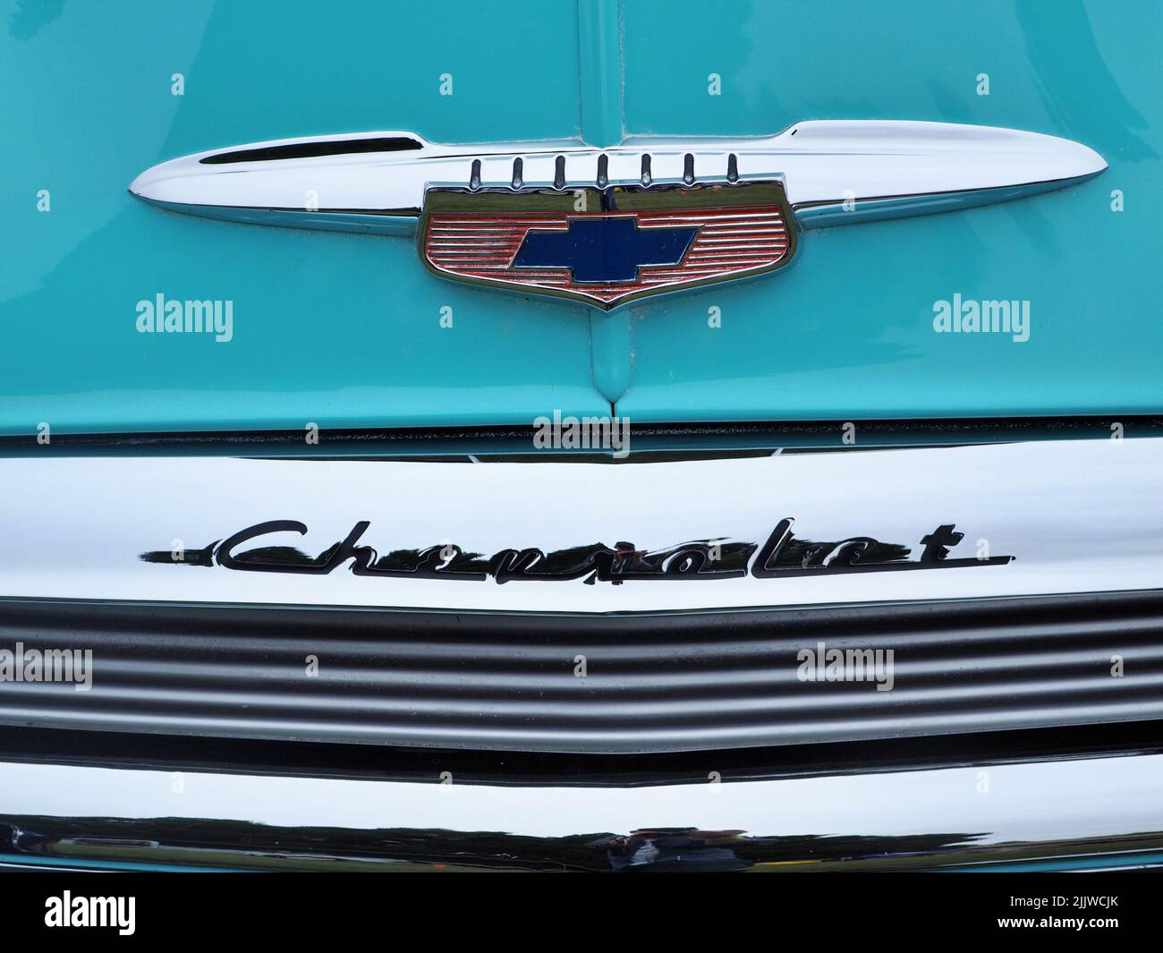 The closeup view of the blue Chevrolet classic car logo Stock Photo Alamy