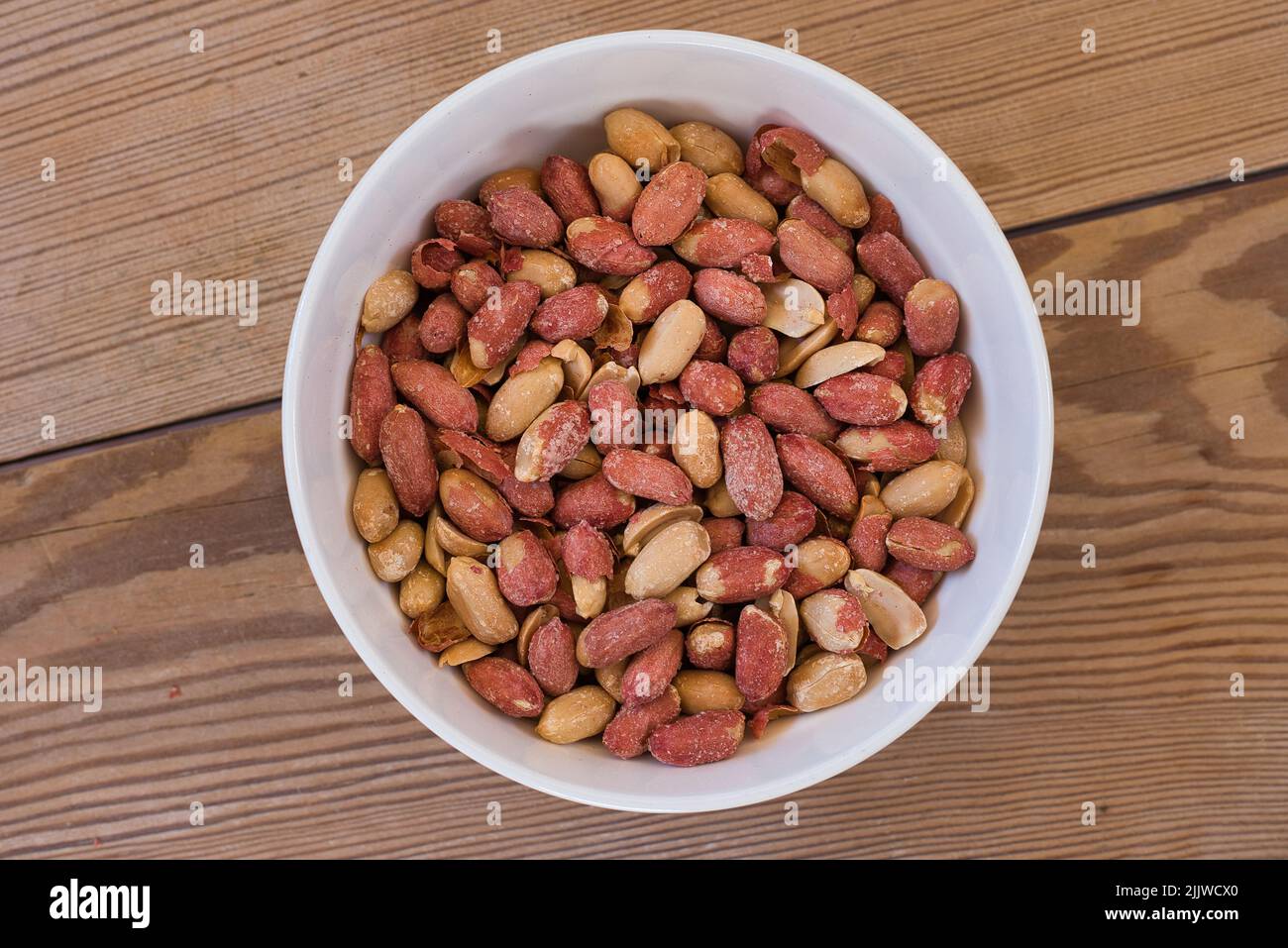 Salted peanuts. The peanut is a nut of high nutritional value, very
