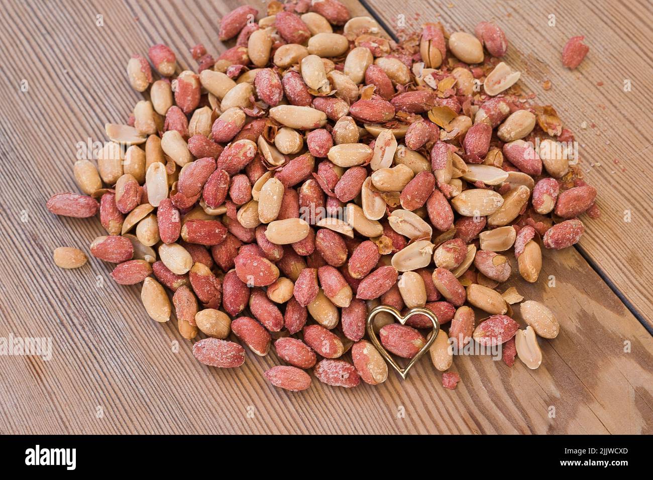 Salted peanuts. The peanut is a nut of high nutritional value, very