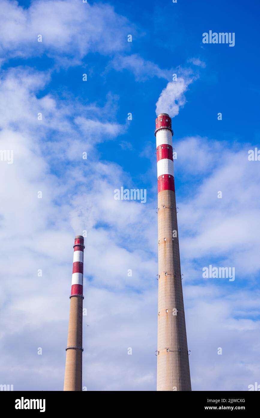 a Chimney under blue sky Stock Photo - Alamy