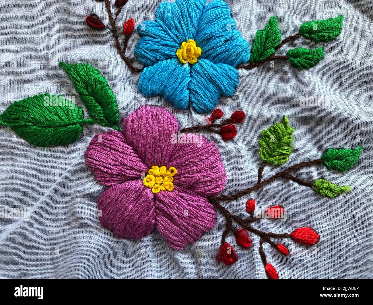 Satin stitch flower design (Hand embroidery flower design) Stock Photo