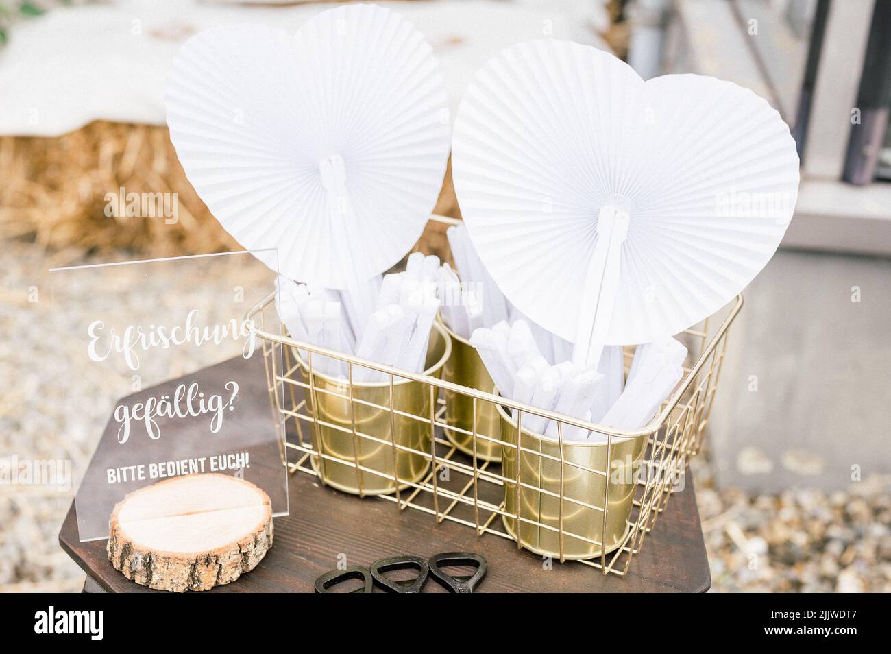 A close-up shot of heart-shaped fan decorations and a congratulation ...