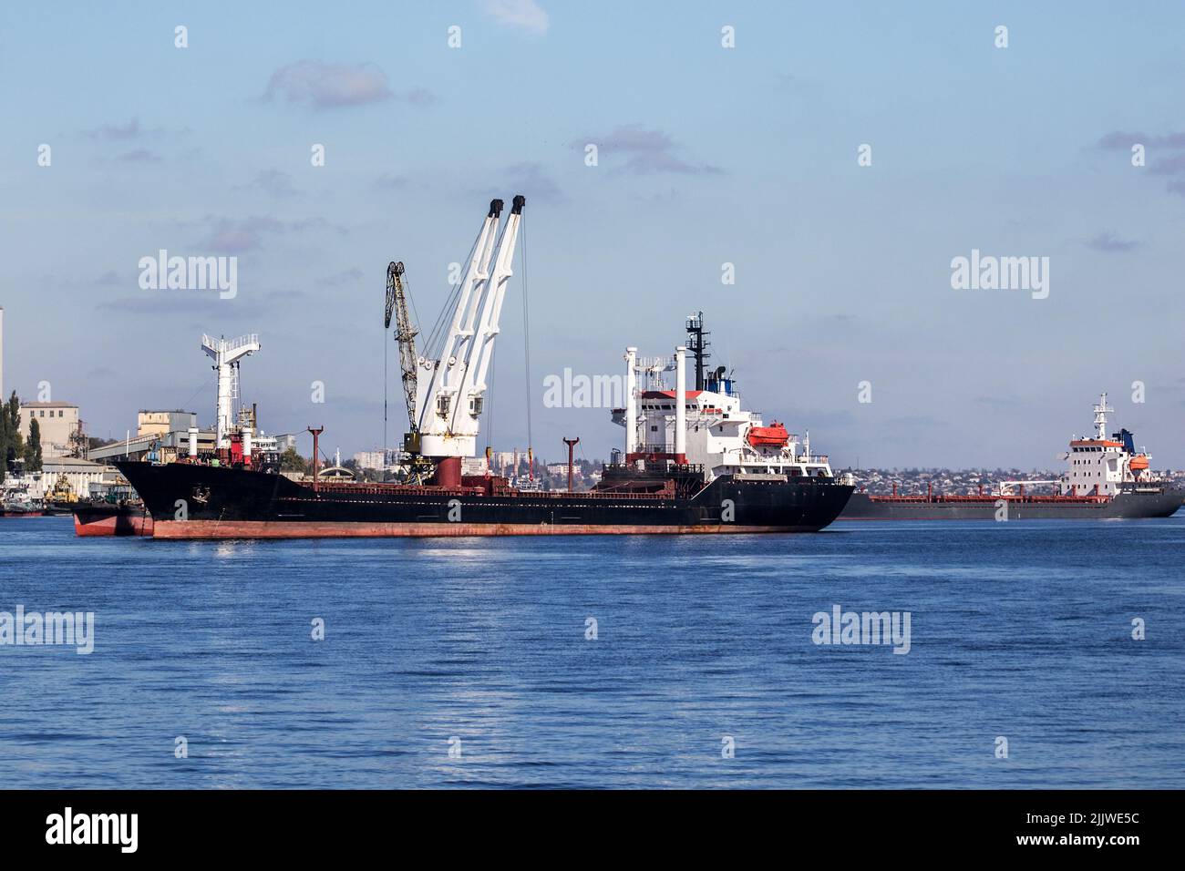 image of a large dry cargo ship on the roadstead of the Dnieper river Stock Photo