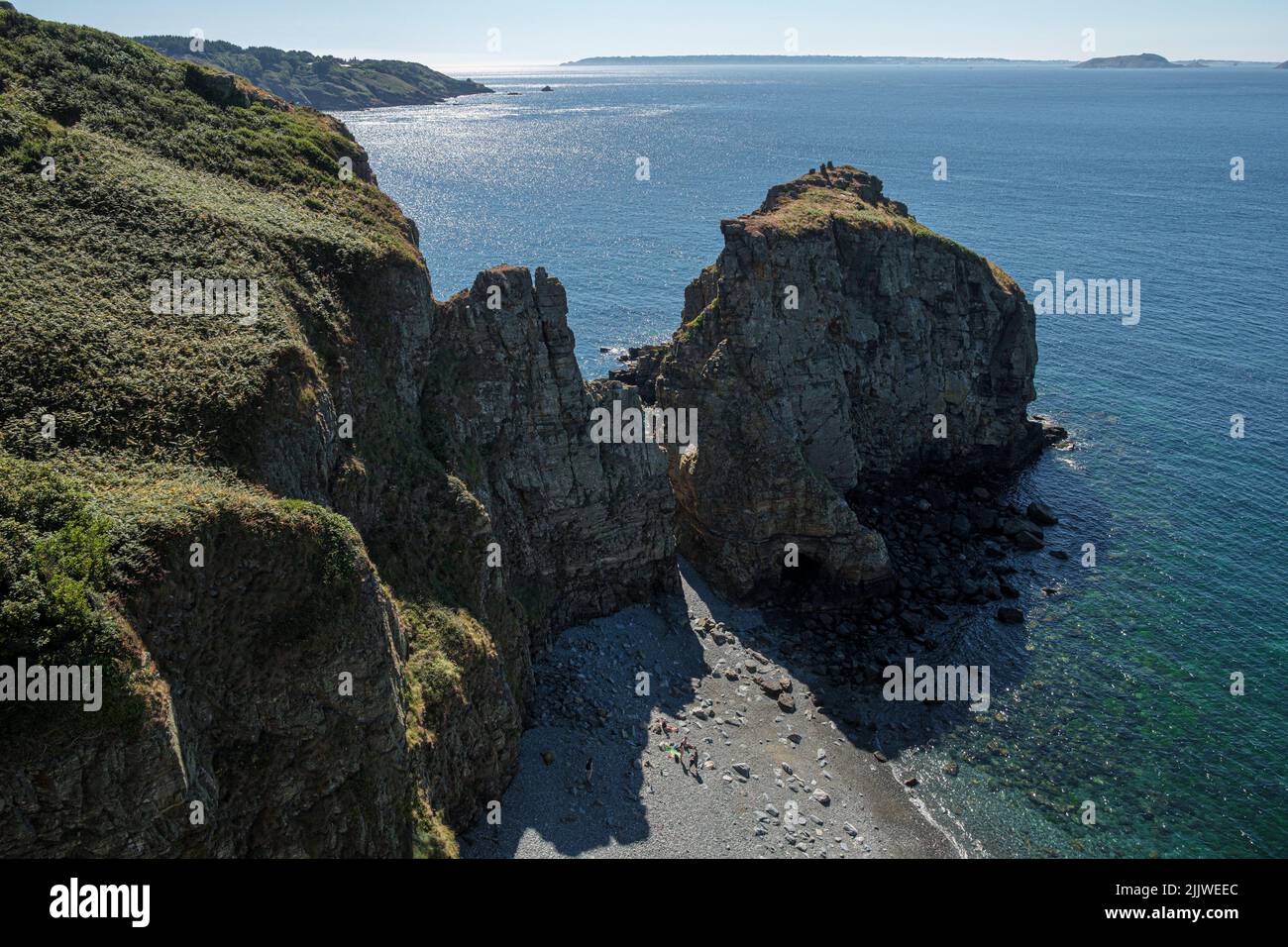 Port du Moulin and view towards Guernsey in the distance, Sark, Channel Islands Stock Photo