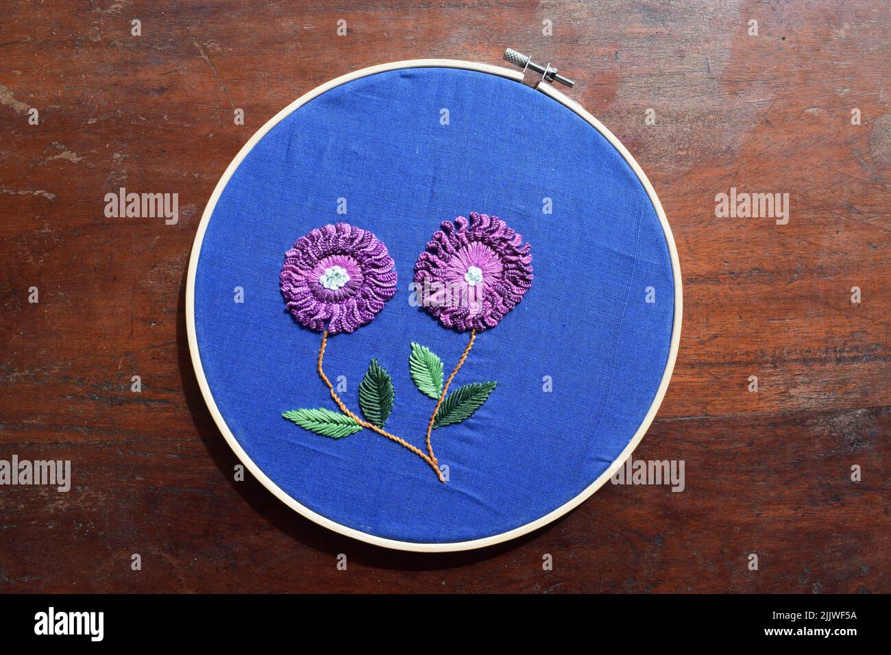 lazy daisy cast on stitch flower Stock Photo