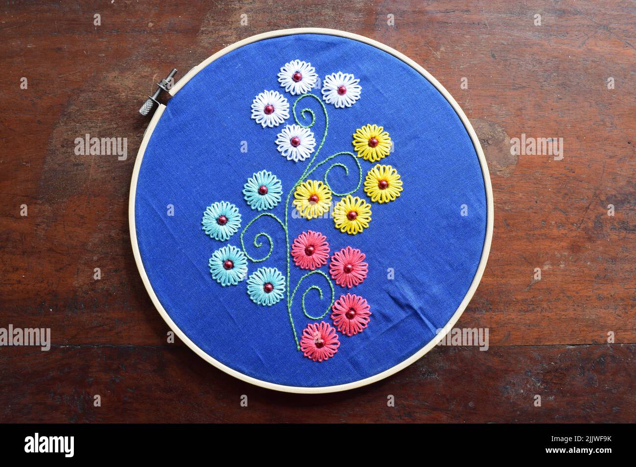 Lazy daisy flower stitches on the embroidered design Stock Photo Alamy