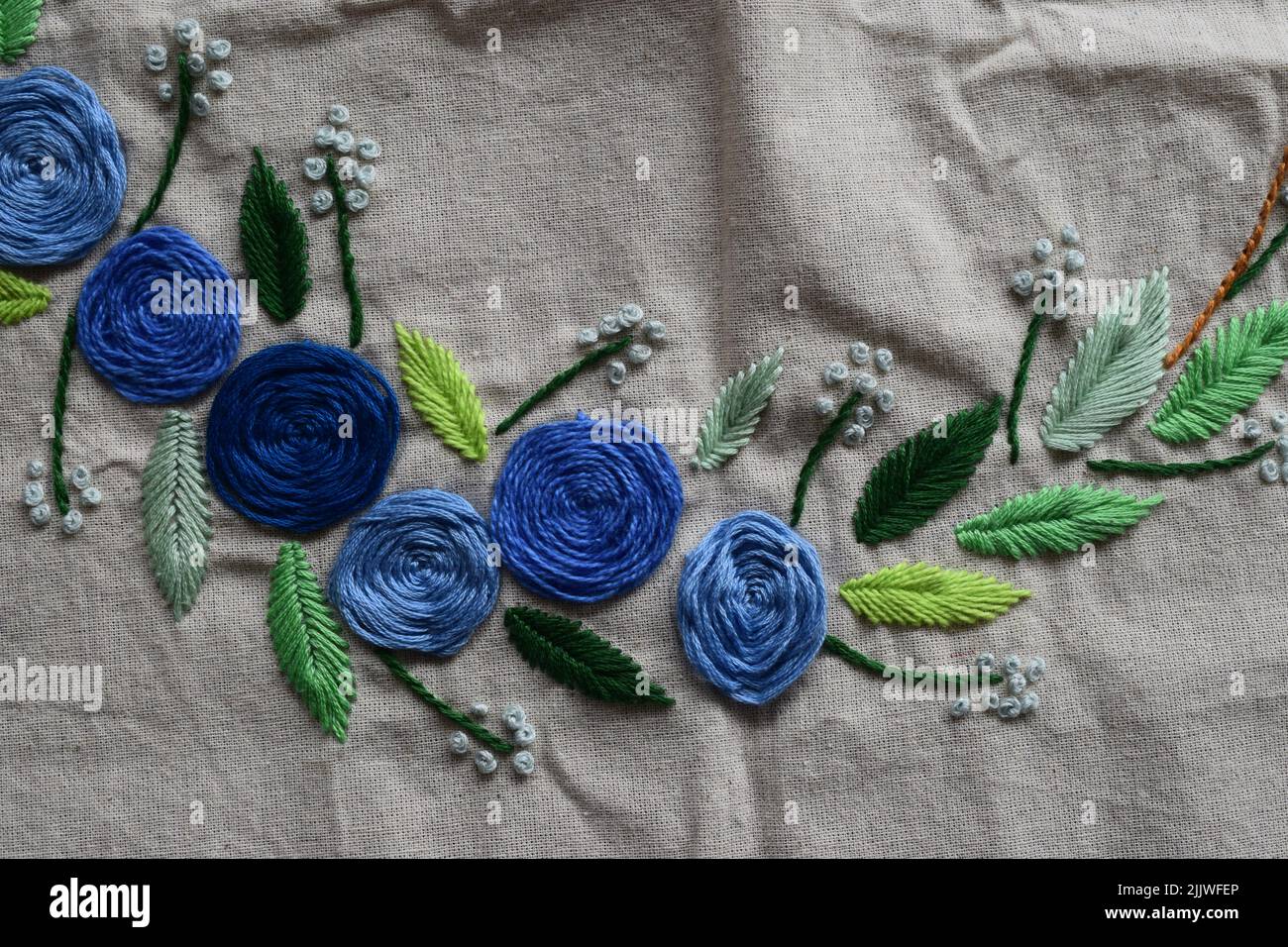 Embellished and embroidered fabric trims and ribbons on display Stock Photo  - Alamy