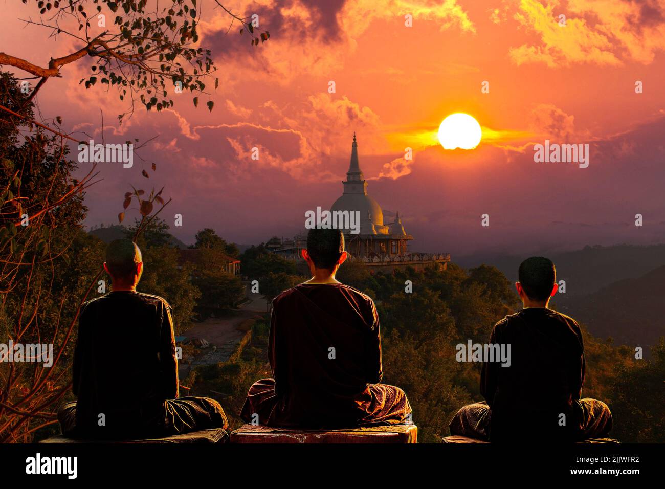 Sri Lanka Temple Sunset Siri Indika Saman Stupa with Buddhist monks Stock Photo