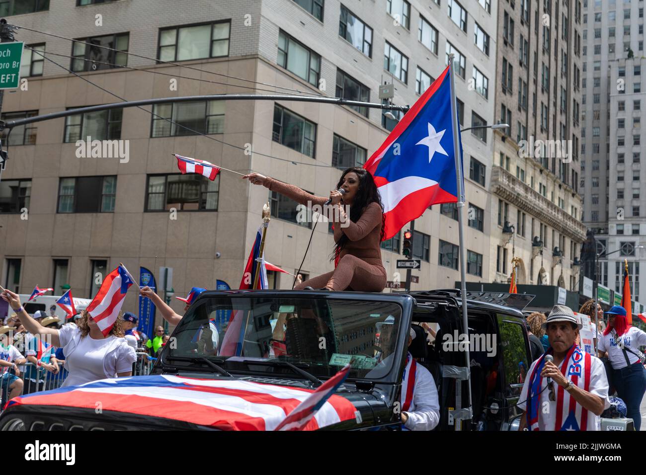 Bright celebration of the Puerto Rican Day on NYC streets, USA Stock Photo