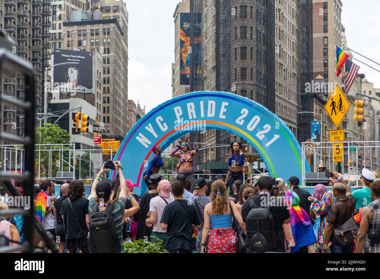 A singer performing live at the Pride Month Parade 2021 on the streets ...