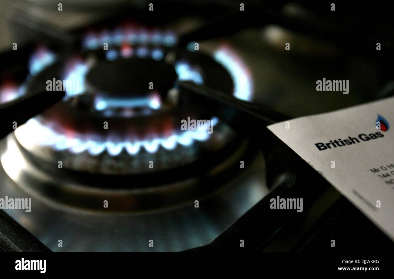 File photo dated 08/02/07 of a gas hob with a bill from British Gas. British Gas owner Centrica's half-year profit has soared five-fold to £1.3 billion after being boosted by rocketing energy prices that are battering households. Issue date: Thursday July 28, 2022. Stock Photo