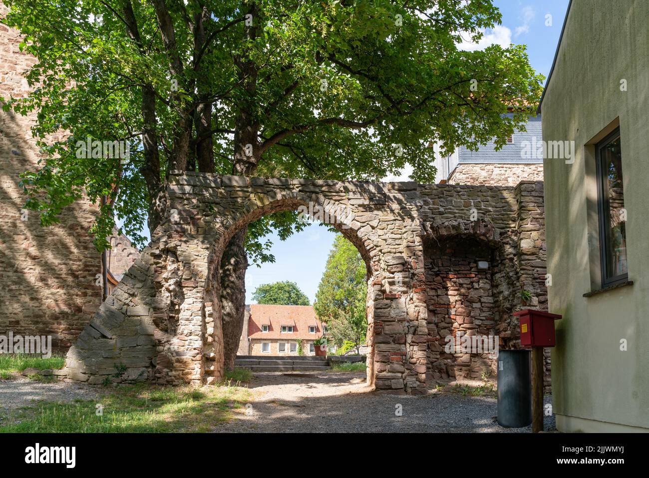 Old stone gate Ilsenburg monastery in summer Stock Photo