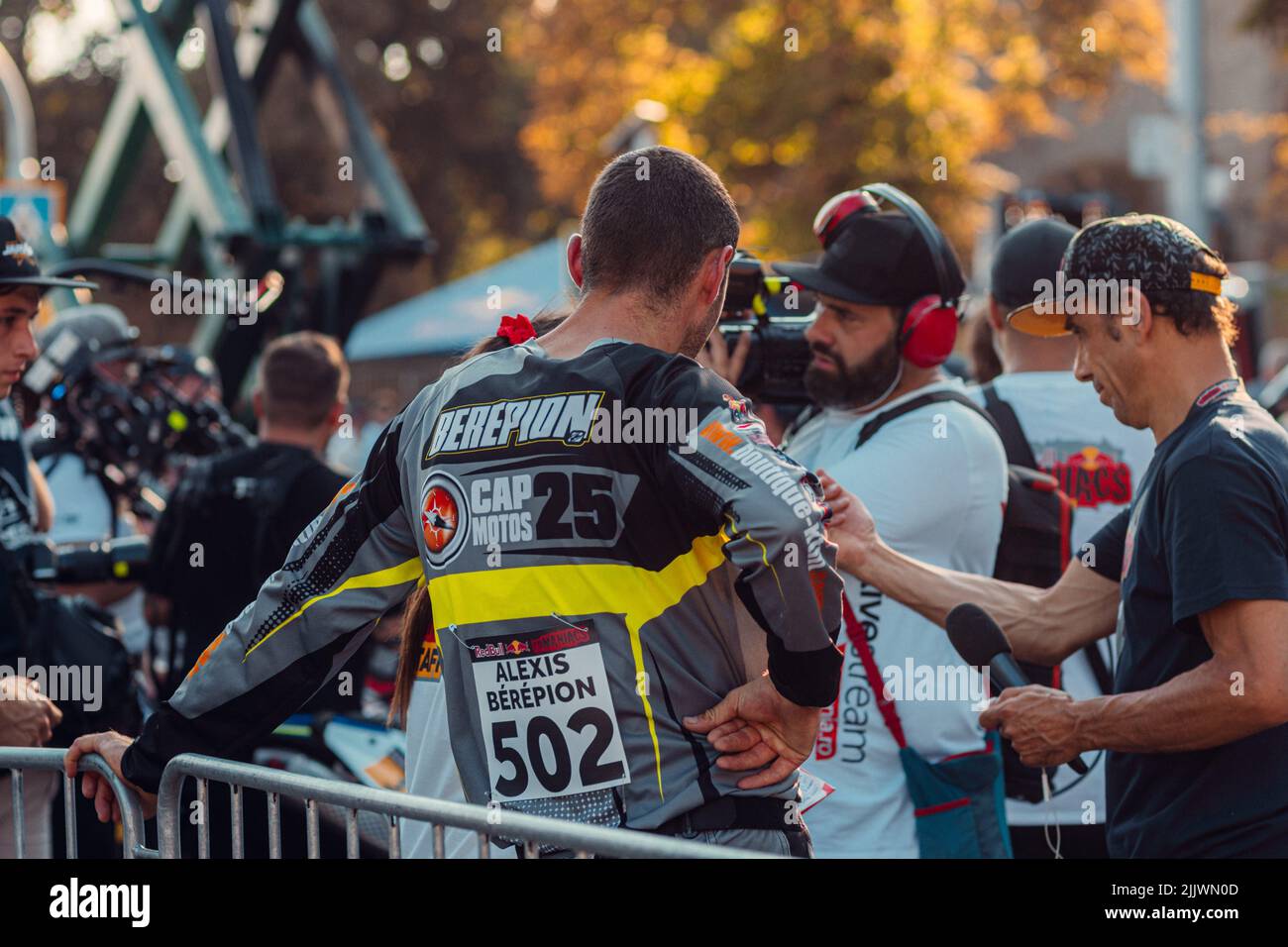 the participant in the crowd during Red Bull Romaniacs hard enduro Rallye - Prolog in Sibiu city, Romania Stock Photo