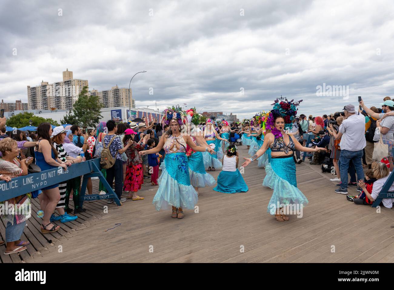 Beautiful women in mermaids costumes dancing at the 40th Annual Mermaid