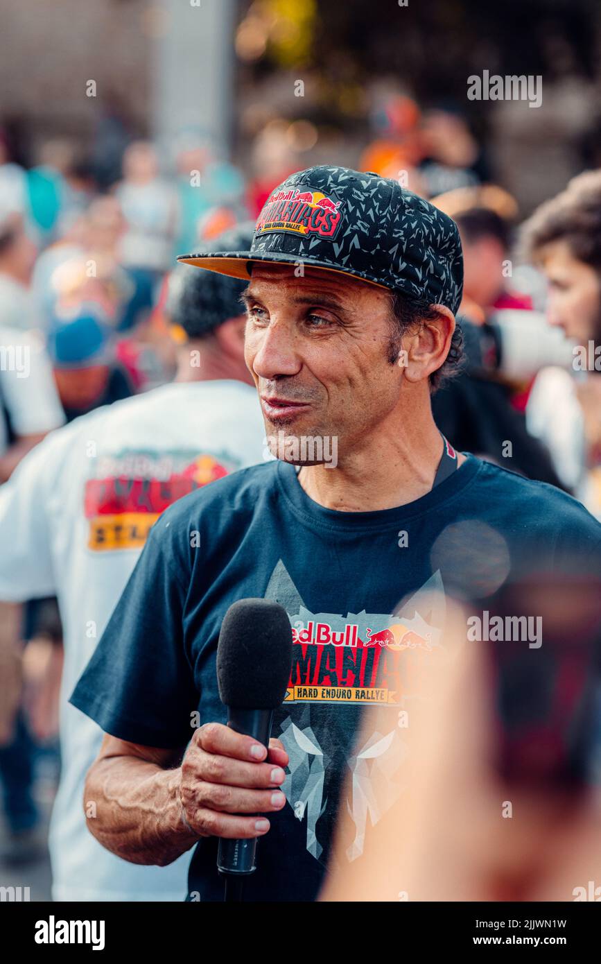 a man talking into microphone during Red Bull Romaniacs hard enduro Rallye - Prolog in Sibiu city, Romania Stock Photo