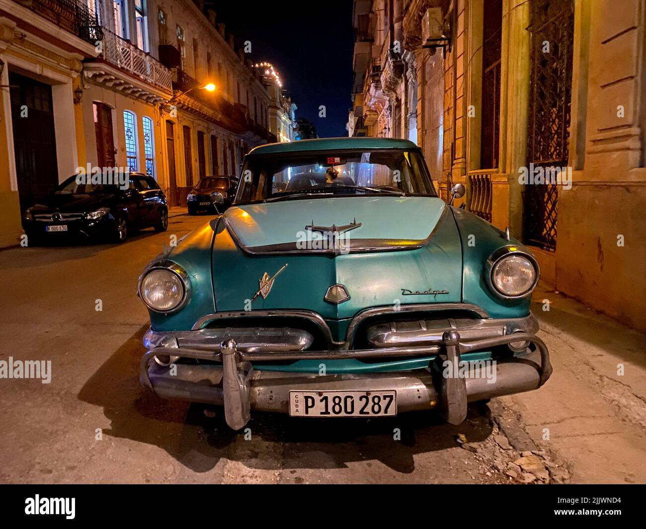 Vintage 1956 pearl green Dodge Kingsway antique car in Concordia street downtown Havana, Cuba. Stock Photo