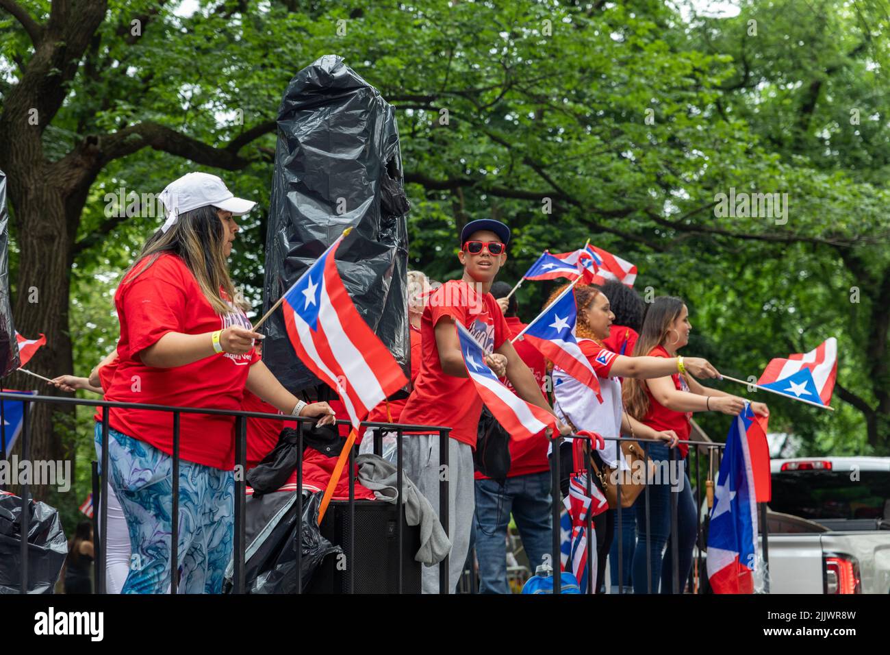 A large crowd of people coming out to celebrate the Puerto Rican Day