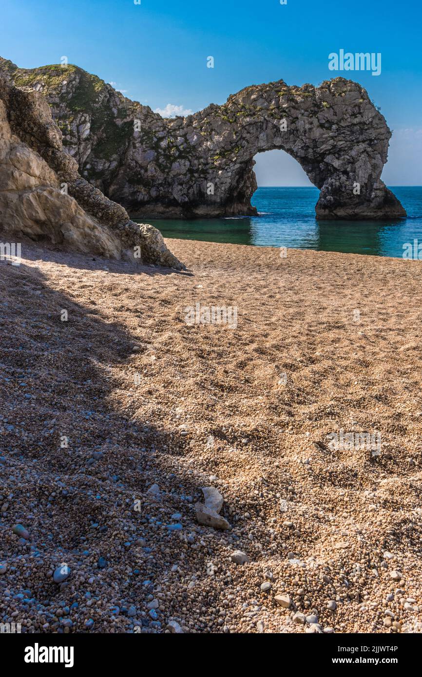 Durdle Door (sometimes Durdle Dor) is a natural limestone arch on the Jurassic Coast near Lulworth in Dorset - privately owned by the Weld Family Stock Photo