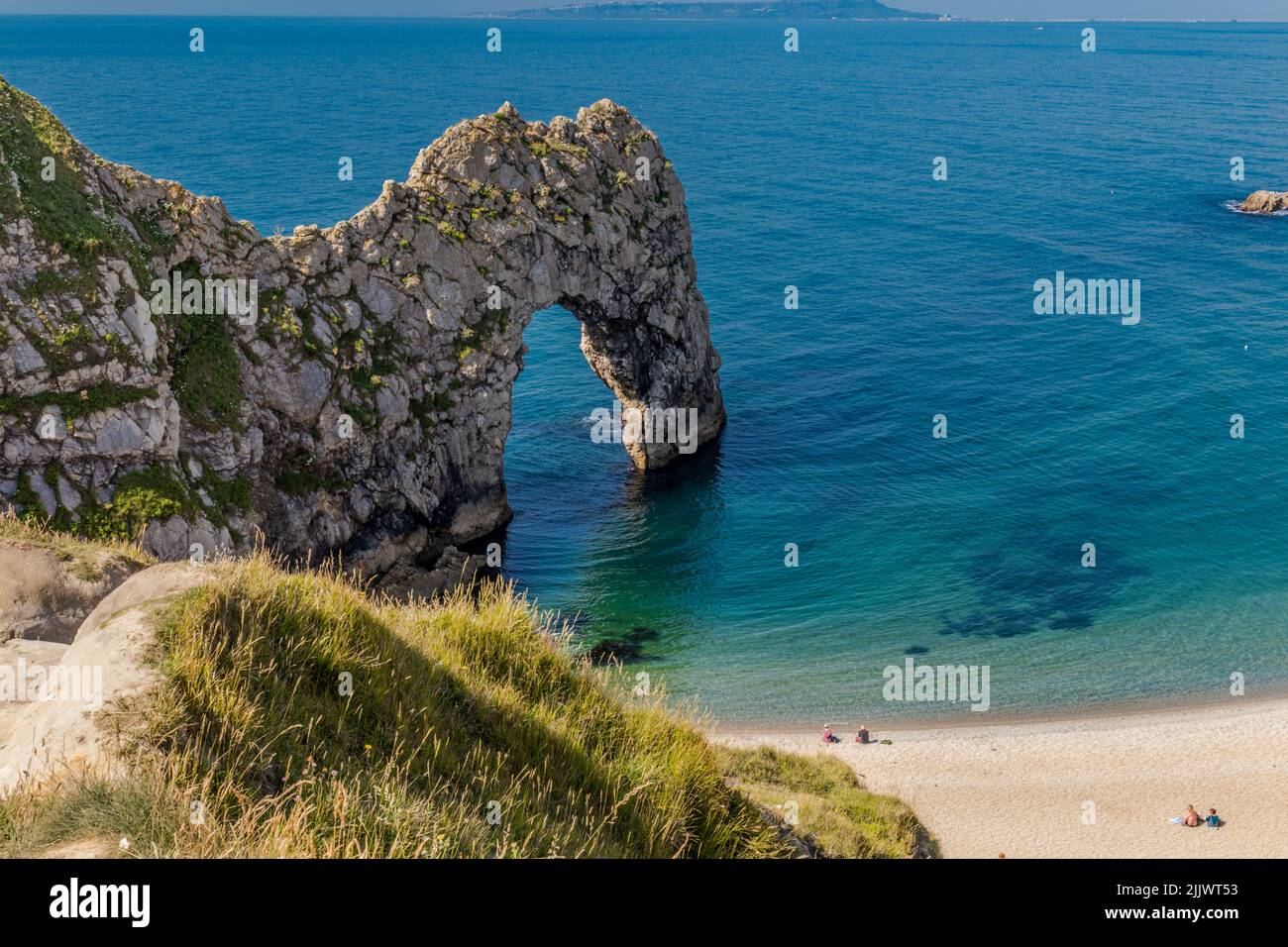 Durdle Door (sometimes Durdle Dor) is a natural limestone arch on the Jurassic Coast near Lulworth in Dorset - privately owned by the Weld Family Stock Photo