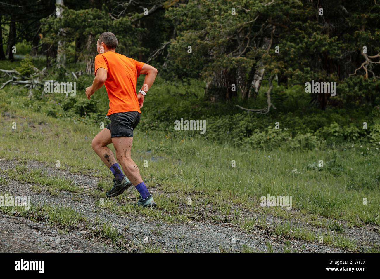 male runner running uphill vertical kilometer Stock Photo