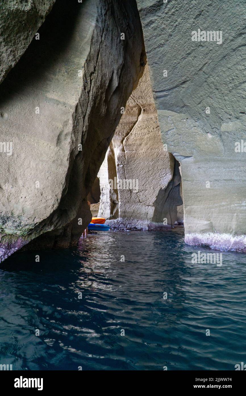 kayak napoli tour - grotte e spiaggia di trentaremi Stock Photo