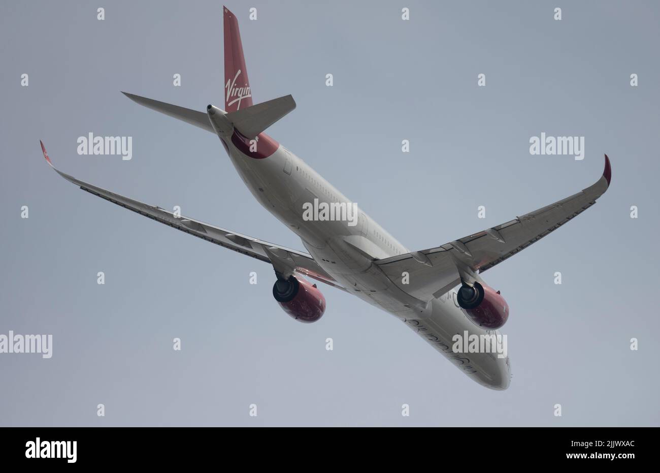 Heathrow Airport, London, UK. 28 July 2022. Virgin Atlantc Airbus A350 G-VRNB taking off from Southern runway at Heathrow on London to Orlando route Stock Photo