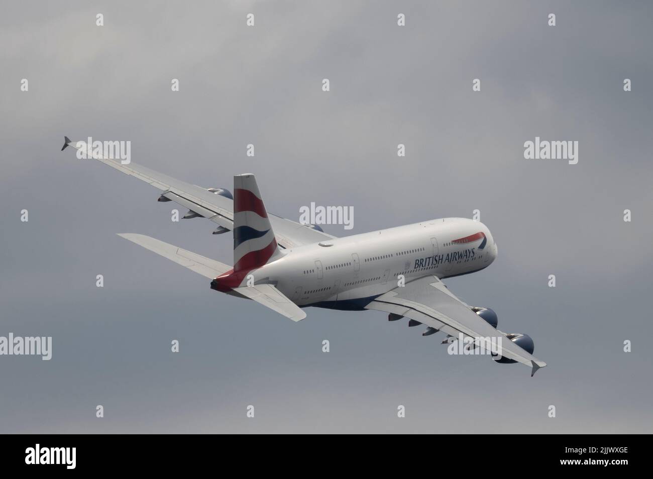 Heathrow Airport, London, UK. 28 July 2022. British Airways Airbus A380 G-XLEF taking off from Southern runway at Heathrow on London to Dallas route Stock Photo