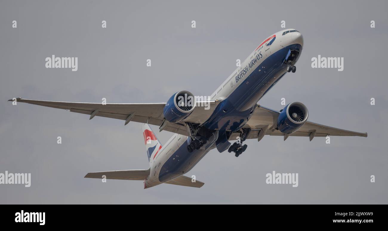 Heathrow Airport, London, UK. 28 July 2022. British Airways Boeing 777 G-STBI taking off from Southern runway at Heathrow on London to Lagos route Stock Photo