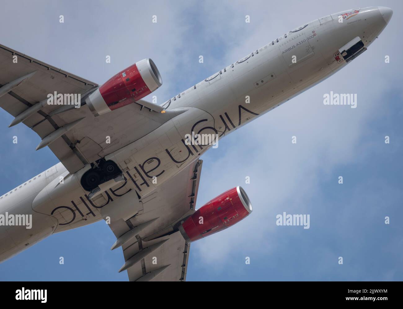 Heathrow Airport, London, UK. 28 July 2022. Virgin Atlantic Airbus A330 Diamond Girl flight taking off from Southern runway at Heathrow Stock Photo