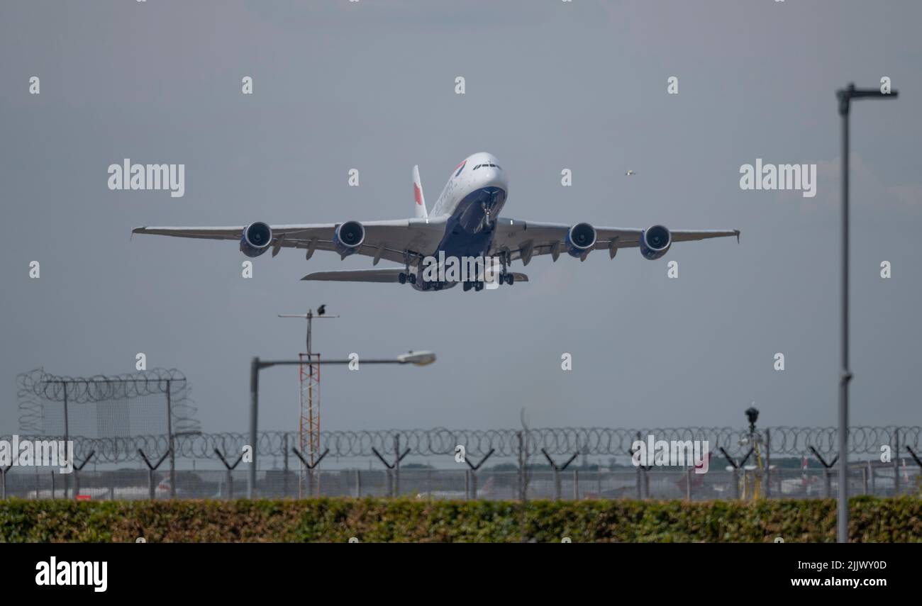 Heathrow Airport, London, UK. 28 July 2022. British Airways Airbus A380 G-XLEK taking off from Southern runway at Heathrow on London to Chicago route Stock Photo