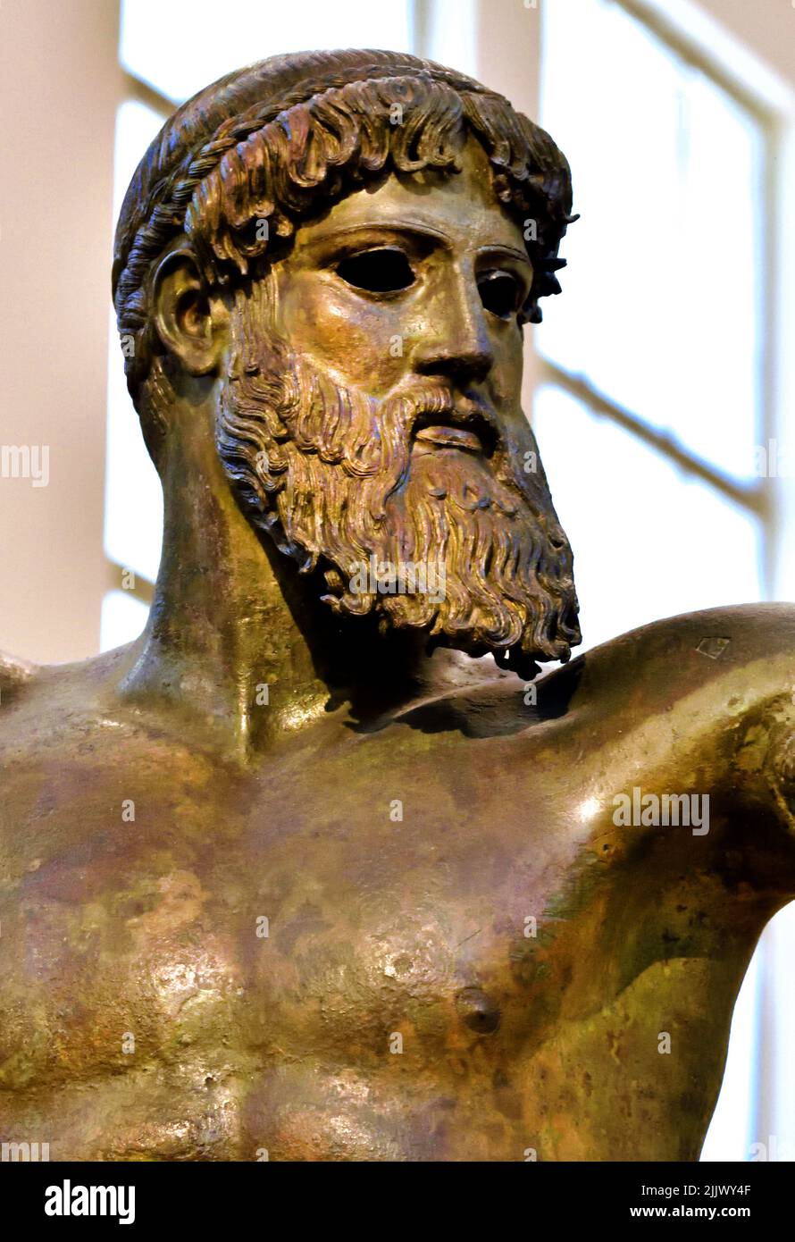 Zeus or possibly Poseidon. Found in the sea of Cape Artemision, Northern Euboea. Classical Period 460 BC. One of the few original statues of the Severe Style,  National Archaeological Museum in Athens.Bronze statue. Stock Photo