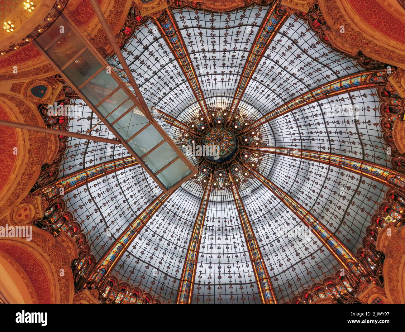 France, Paris, Galeries Lafayette a luxury shopping department store. The Galeries Lafayette offers its visitors a splendid glass Cupola, rising to a Stock Photo