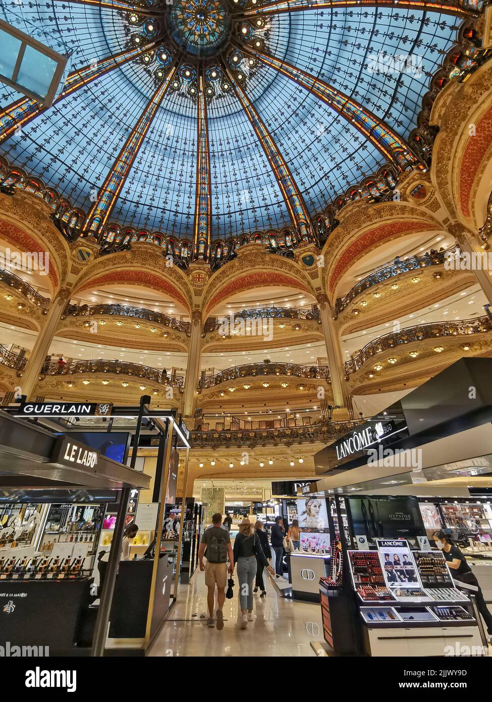 France, Paris, Galeries Lafayette a luxury shopping department store. The Galeries Lafayette offers its visitors a splendid glass Cupola, rising to a Stock Photo